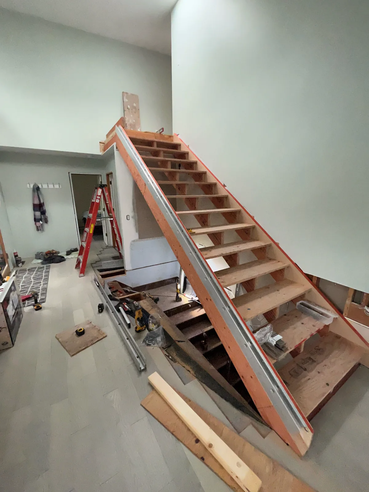 Stair stringers and treads being framed inside a new build
