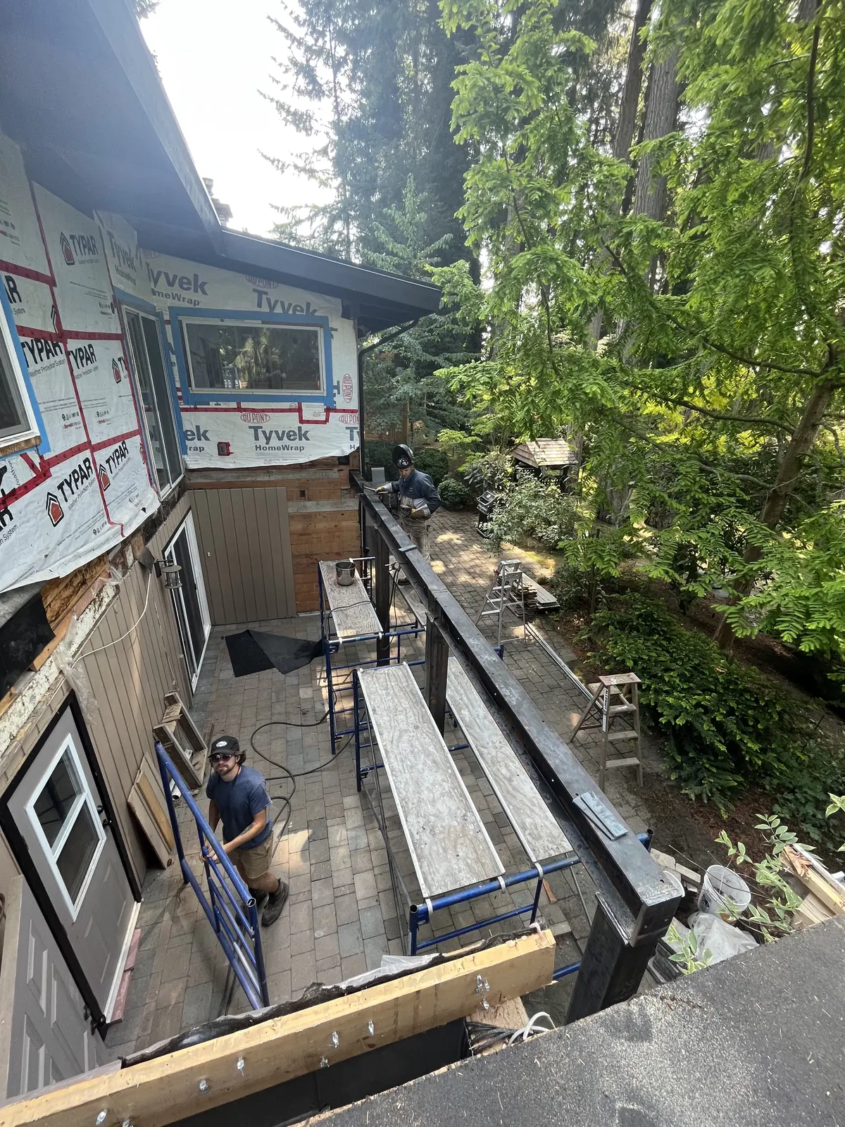 Exterior wall and window opening being framed
