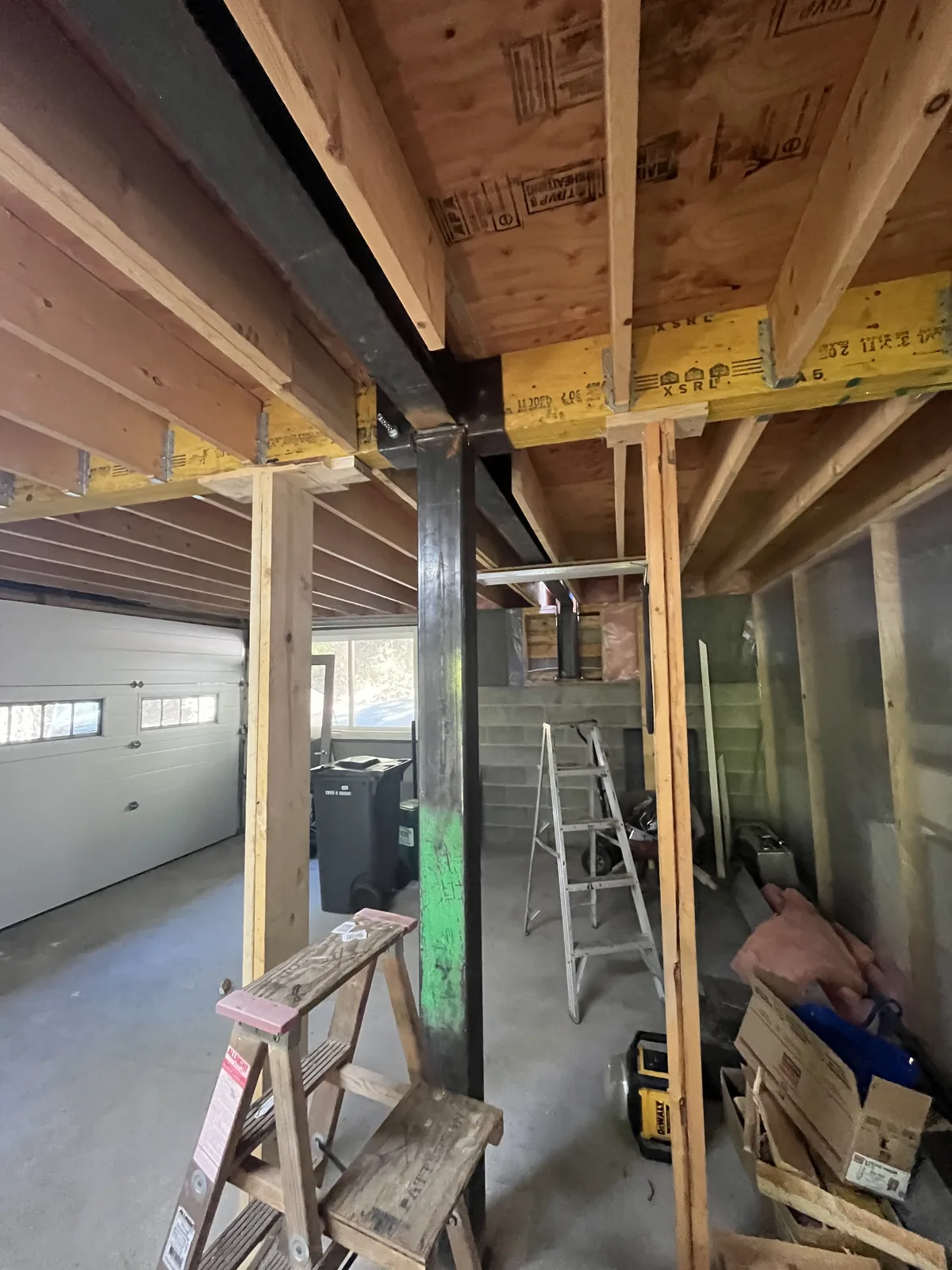 Exposed beam and framing inside a room under construction