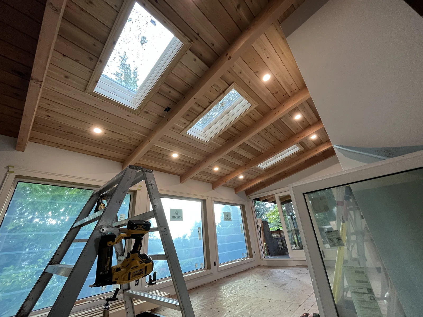 Skylights set into a cedar ceiling during construction
